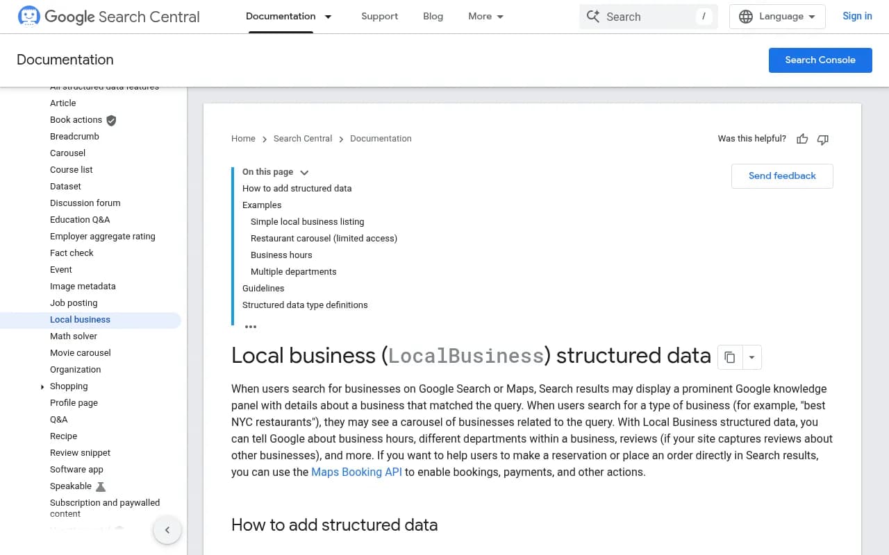 Google Search Central documentation page for LocalBusiness structured data, showing required properties and a JSON-LD example